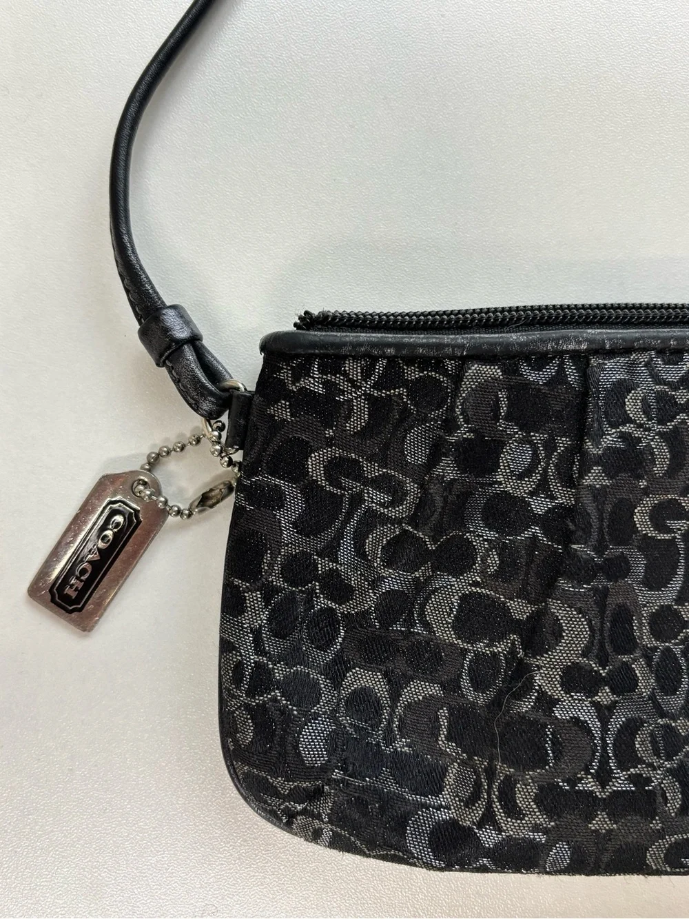 Coach, Black and silver lurex wristlet pre owned loved . Vintage